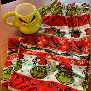 The Grinch Christmas set pj pants ants and coffee mug to match . Pants size M